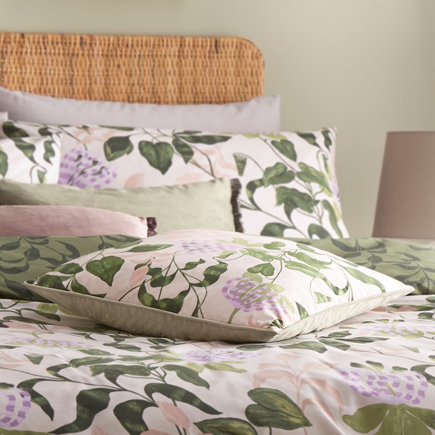Passiflora Piped Velvet Cushion - Peach/Vine Green