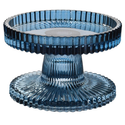 Blue glass candle holder on a white background